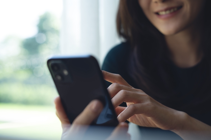 Patient reviewing treatment plan and support on phone